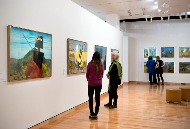 People viewing artworks at Canberra Museum and Gallery, Canberra, Australian Capital Territory © Penny Bradfield, VisitCanberra People viewing artworks at Canberra Museum and Gallery, Canberra, Australian Capital Territory © Penny Bradfield, VisitCanberra