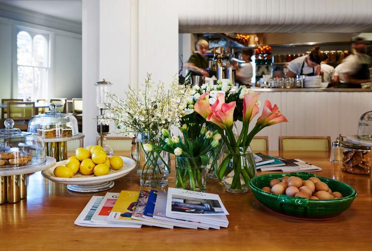 Table with flowers and magazines at Bills, Darlinghurst, Sydney, New South Wales © Megann Evans Photography Table with flowers and magazines at Bills, Darlinghurst, Sydney, New South Wales © Megann Evans Photography
