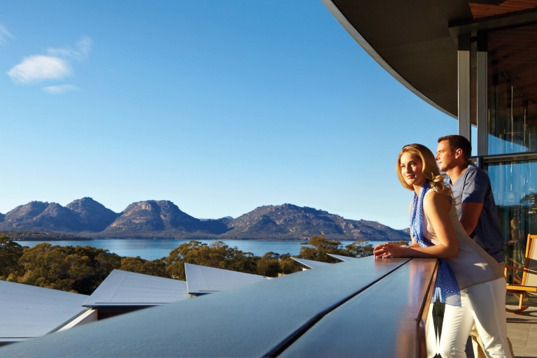 Couple admiring the view over Freycinet National Park from Saffire Freycinet © Saffire Freycinet Couple admiring the view over Freycinet National Park from Saffire Freycinet © Saffire Freycinet