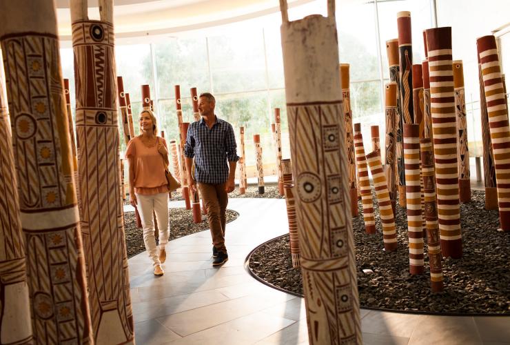 Couple strolls through an Aboriginal artwork exhibit at the National Gallery of Australia in Canberra © Tourism Australia Couple strolls through an Aboriginal artwork exhibit at the National Gallery of Australia in Canberra © Tourism Australia
