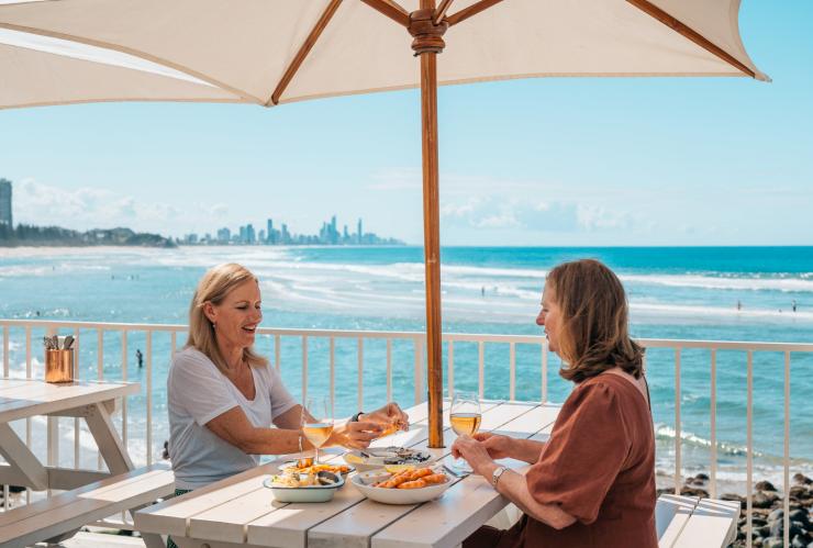 Women dining at Burleigh Pavilion on the Gold Coast © Destination Gold Coast Women dining at Burleigh Pavilion on the Gold Coast © Destination Gold Coast