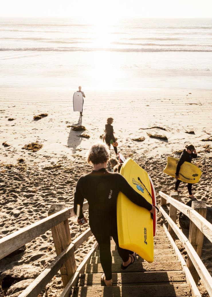 Surfers at a beach in Port Fairy © Belinda Van Zanen Media Surfers at a beach in Port Fairy © Belinda Van Zanen Media