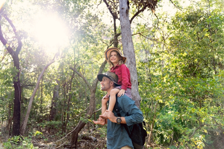 A child sits on her father's shoulders in the forest on a tour with Offroad Dreaming, Kakadu National Park, Northern Territory © Tourism Australia A child sits on her father's shoulders in the forest on a tour with Offroad Dreaming, Kakadu National Park, Northern Territory © Tourism Australia