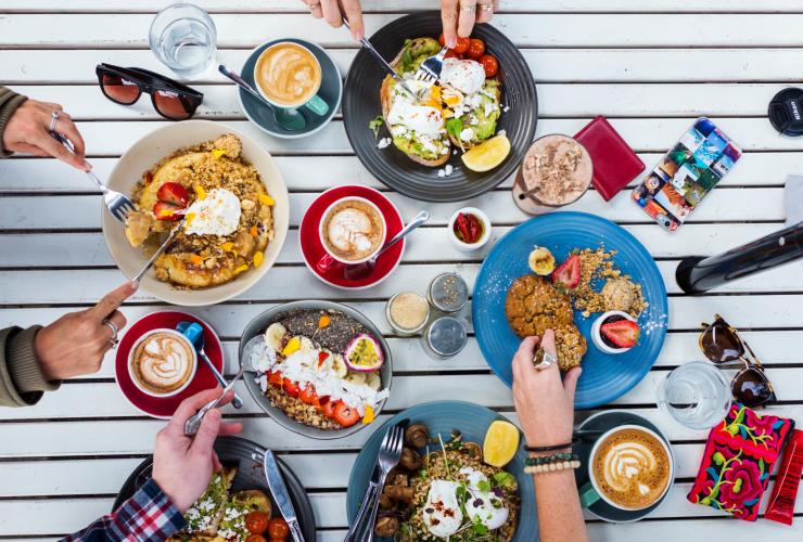 Flatlay of vegetarian dishes available from The Hungry Monkey cafe in Kiama © Lauren Bath Flatlay of vegetarian dishes available from The Hungry Monkey cafe in Kiama © Lauren Bath
