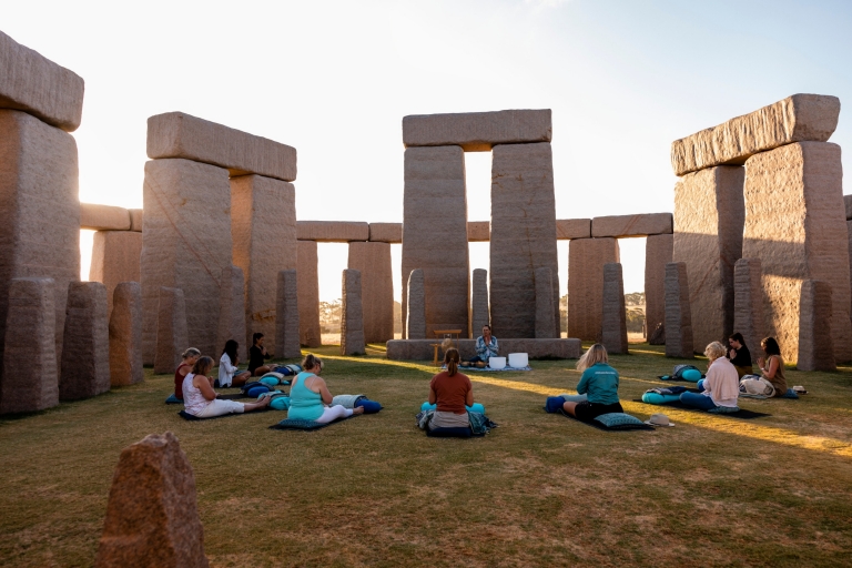 A group of women sitting in a circle on the grass, surrounded by large grey boulders in Esperance, Western Australia © Tourism Australia A group of women sitting in a circle on the grass, surrounded by large grey boulders in Esperance, Western Australia © Tourism Australia
