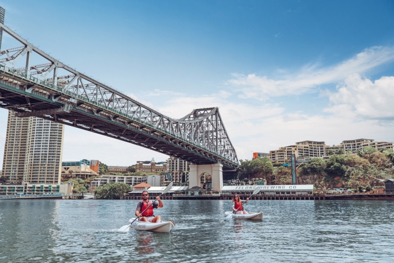 A man and woman kayaking with Riverlife along Brisbane River beneath Story Bridge with Howard Smith Wharves in the background in Brisbane, Queensland © Tourism and Events Queensland A man and woman kayaking with Riverlife along Brisbane River beneath Story Bridge with Howard Smith Wharves in the background in Brisbane, Queensland © Tourism and Events Queensland