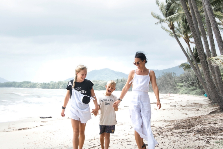 Family walking on the beach at Palm Cove © Tourism and Events Queensland Family walking on the beach at Palm Cove © Tourism and Events Queensland