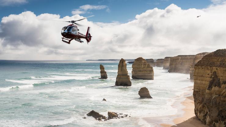 Helicopter over the 12 Apostles, Great Ocean Road, VIC © Visit Victoria Helicopter over the 12 Apostles, Great Ocean Road, VIC © Visit Victoria