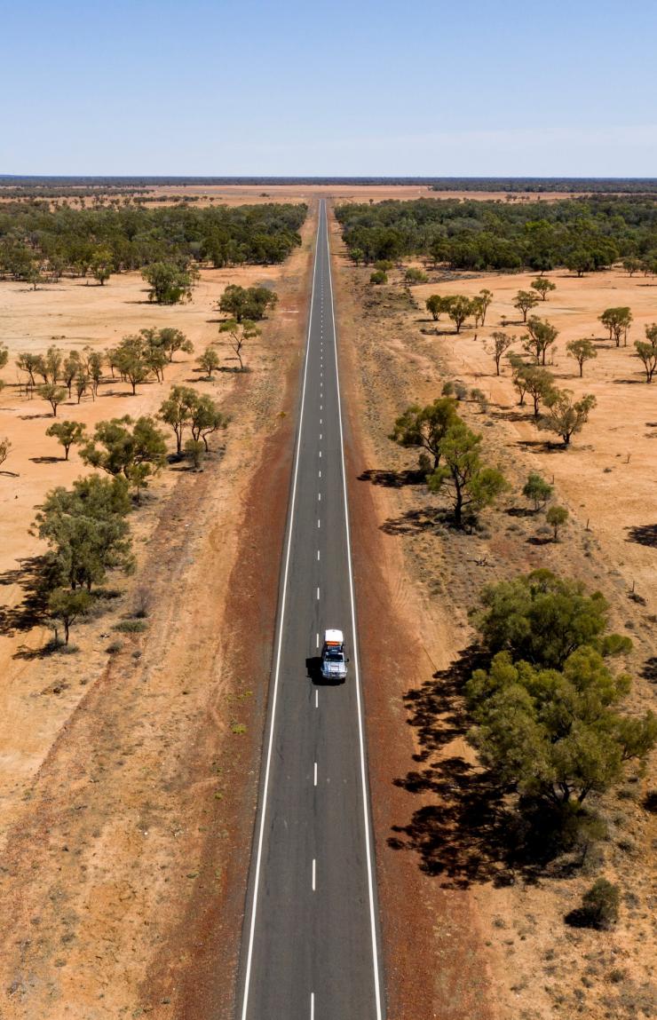 Car drives along the Matilda Way in Outback Queensland © Tourism and Events Queensland  Car drives along the Matilda Way in Outback Queensland © Tourism and Events Queensland