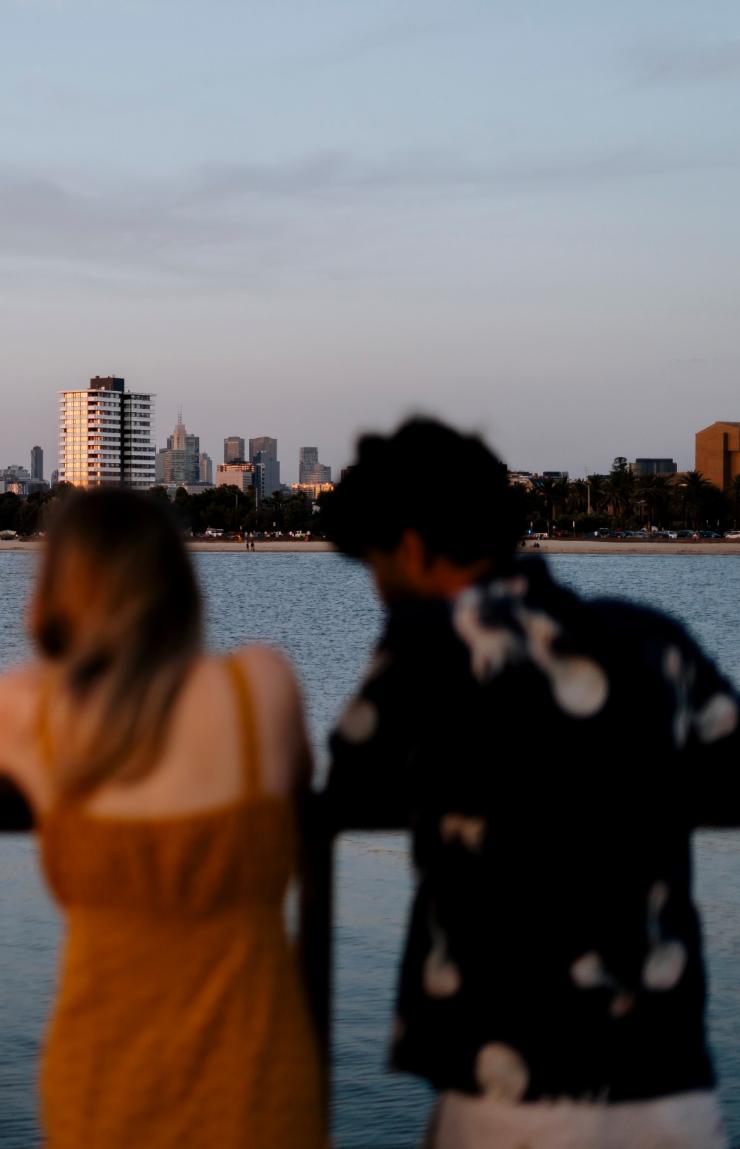 A man and woman admiring the distant view of the city from St Kilda Pier, Melbourne, Victoria © Visit Victoria A man and woman admiring the distant view of the city from St Kilda Pier, Melbourne, Victoria © Visit Victoria
