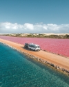 Van driving on a dirt road between pink Lake MacDonnell and Green Lake in the Eyre Peninsula, South Australia © Jaxon Foale